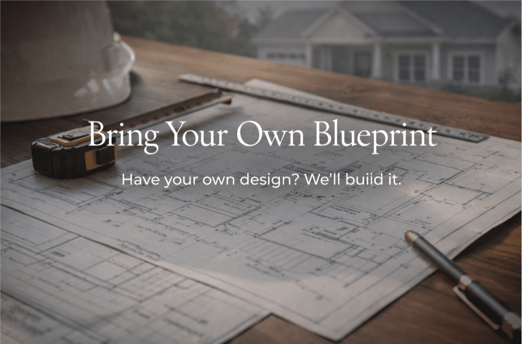 Blueprints and tools on wooden table.