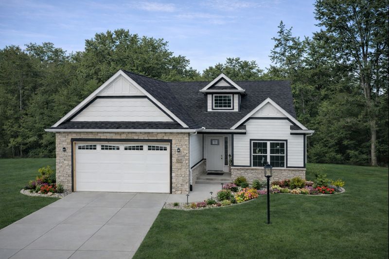 Modern suburban house with a landscaped yard.